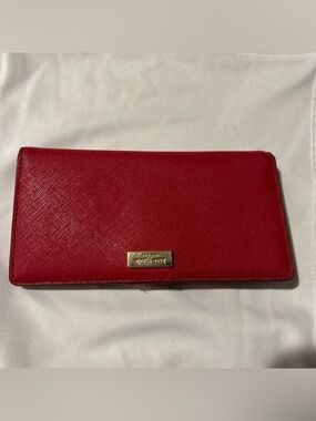 kate spade red saffiano continental wallet with gold plaque